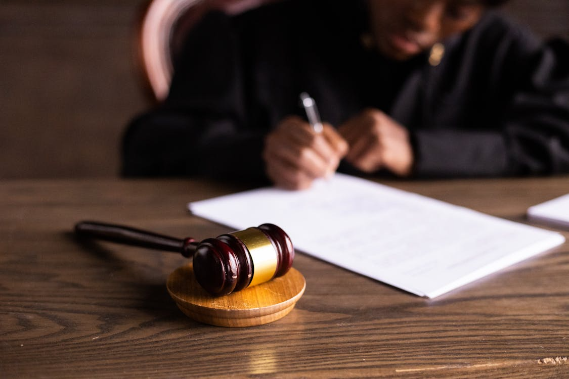 A judge reviews a document.