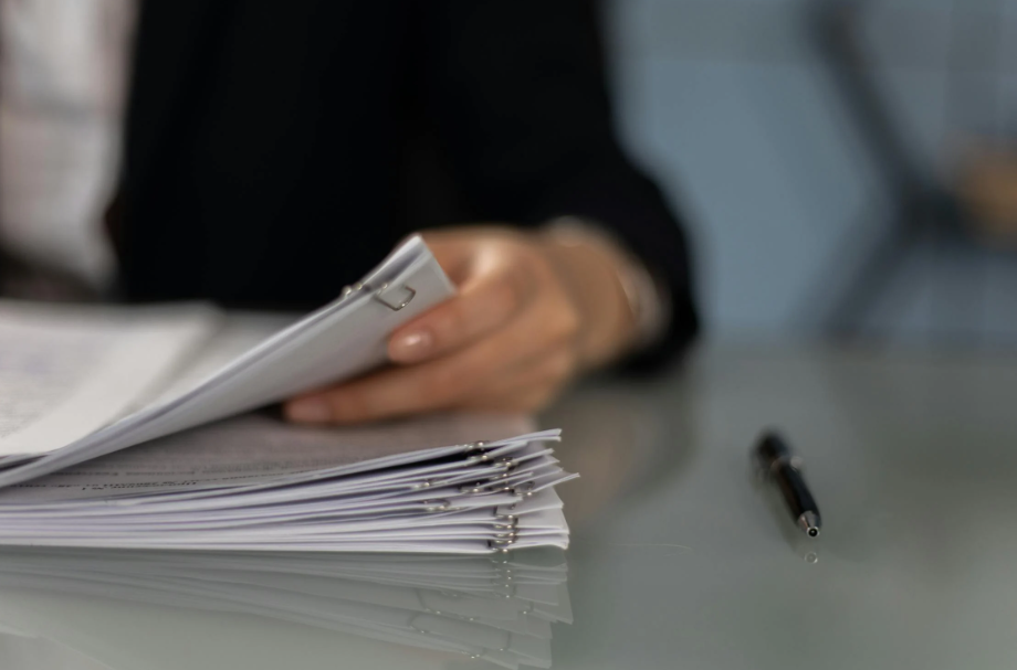 An attorney looking at documents.